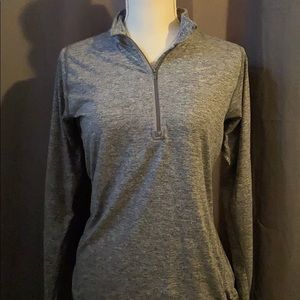 Nike’s zip pull over sweater
